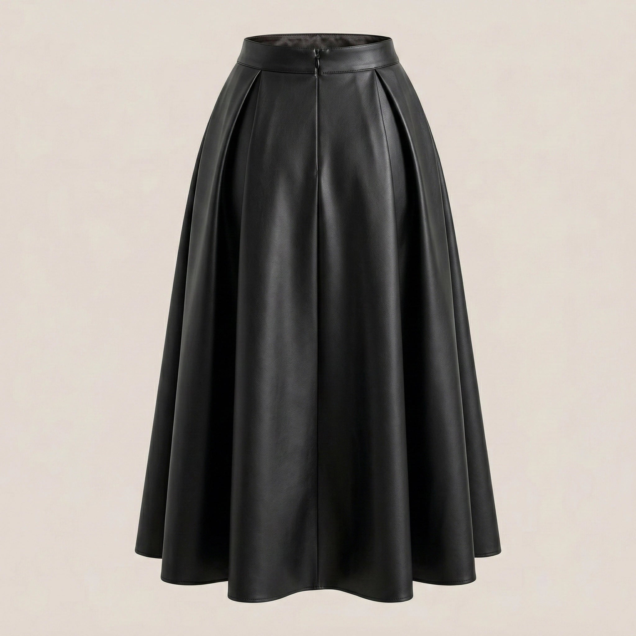 Black leather skirt on a beige background