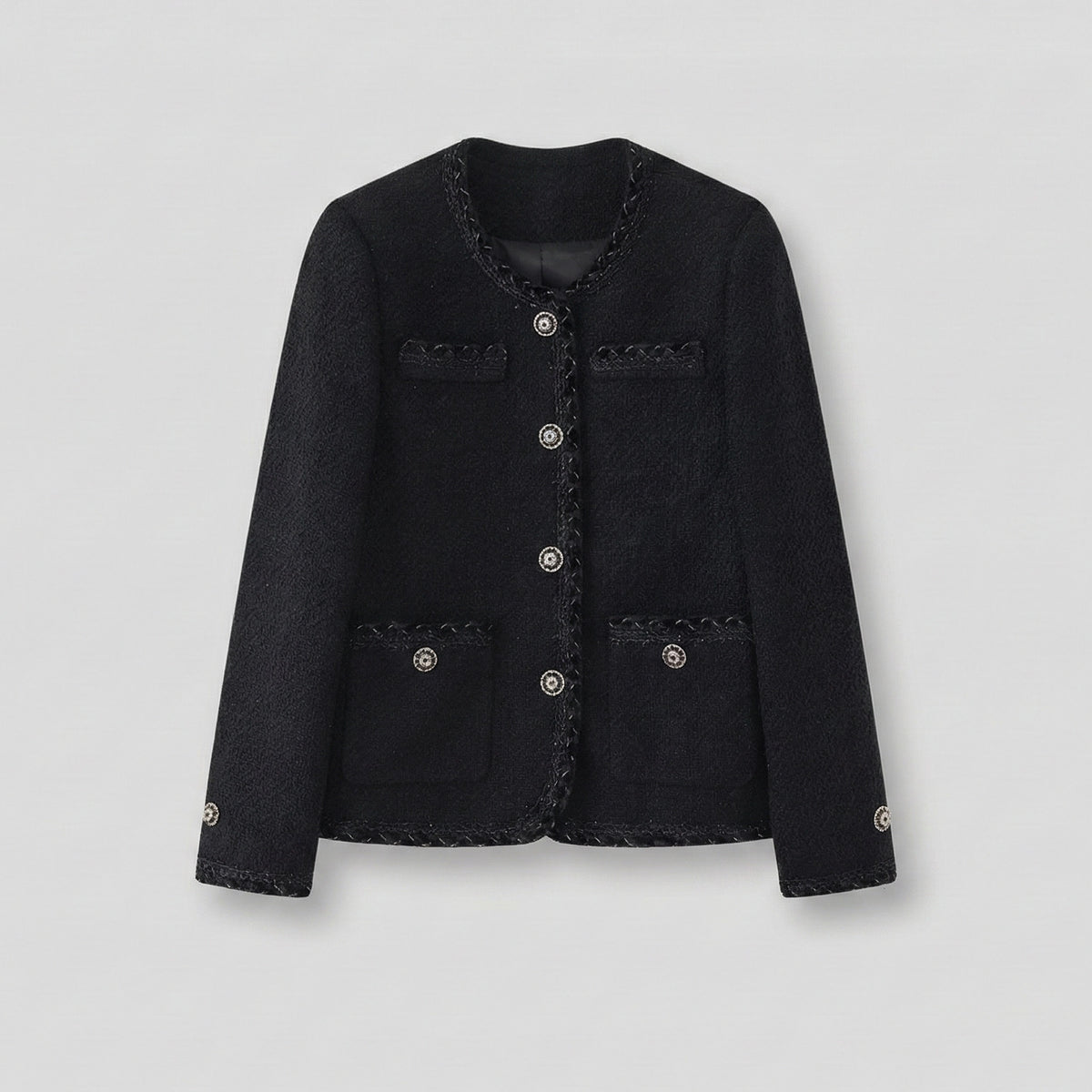 Black jacket with decorative buttons on a light gray background