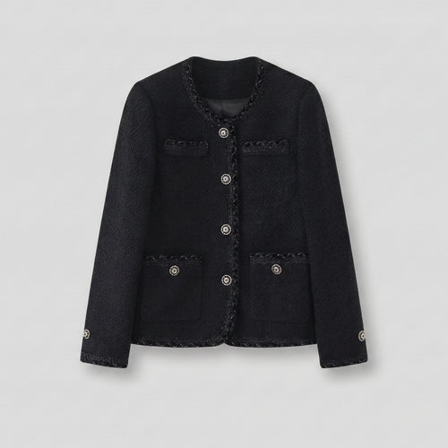 Black jacket with decorative buttons on a light gray background