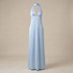 Light blue halter neck gown on a beige background