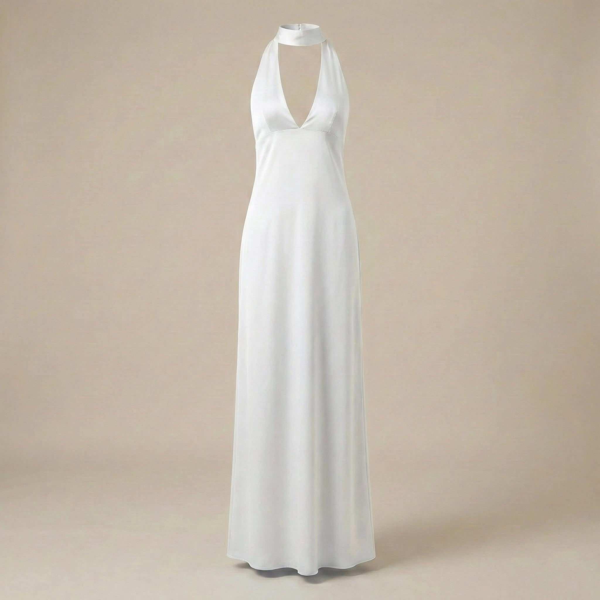 White halter neck dress on a beige background
