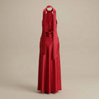 Red evening gown on a beige background