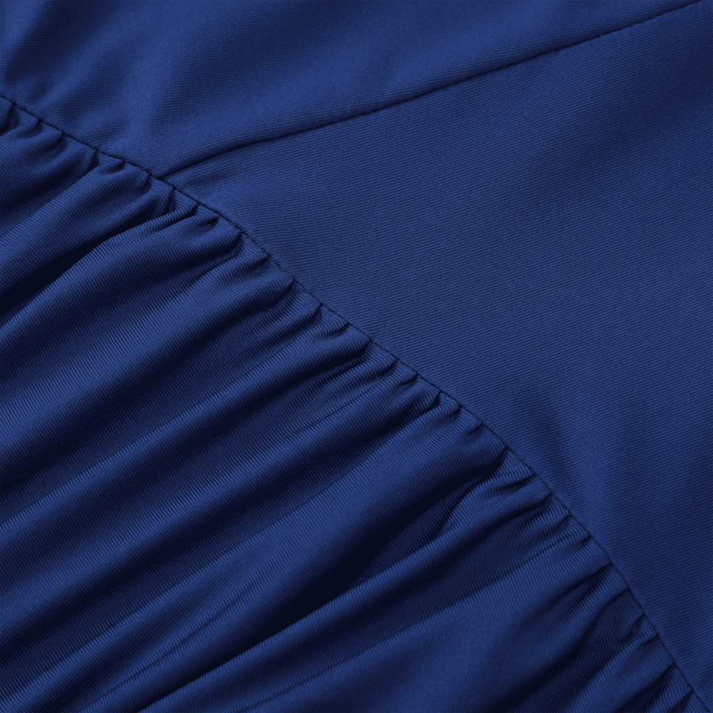 Close-up of a blue fabric with pleated texture