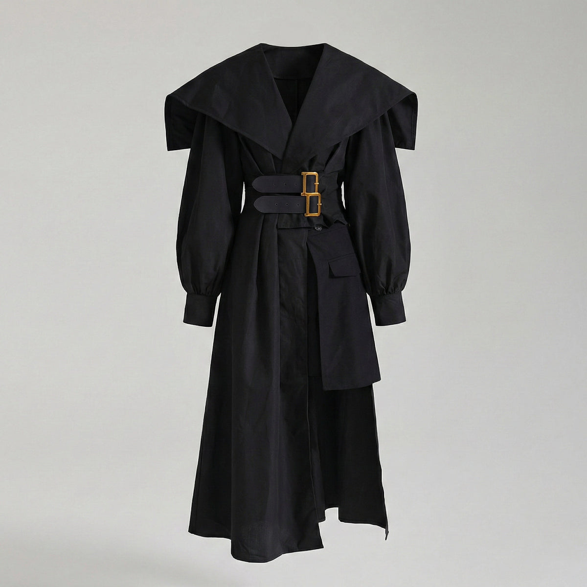 Black coat with a gold buckle on a light gray background