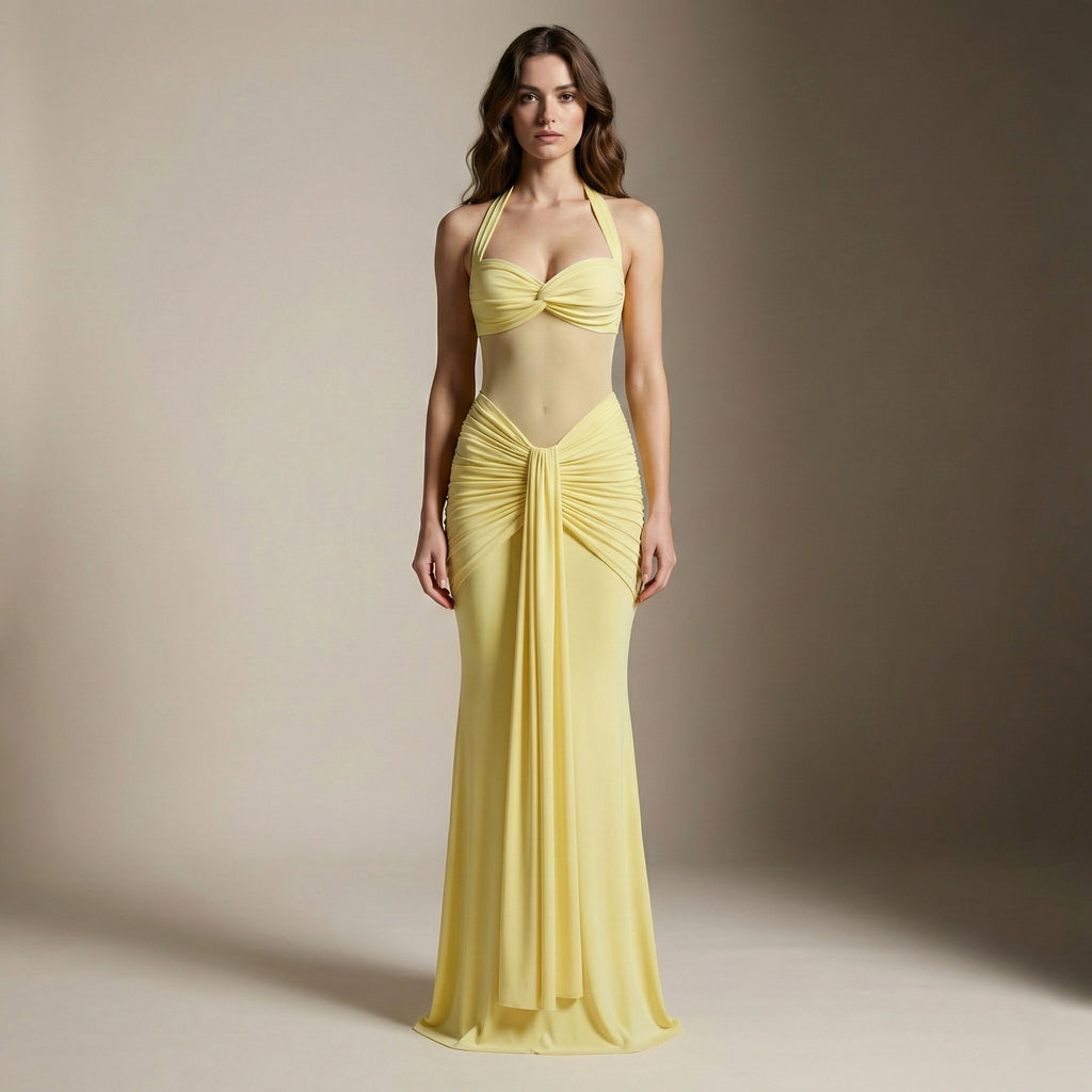 Woman wearing a yellow evening gown against a neutral background