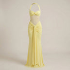 Yellow evening gown on a beige background