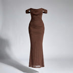 Brown off-shoulder dress on a gray background