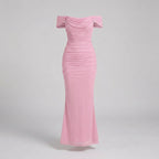 Pink off-shoulder dress on a light gray background