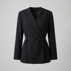 Black blazer with a belt on a gray background