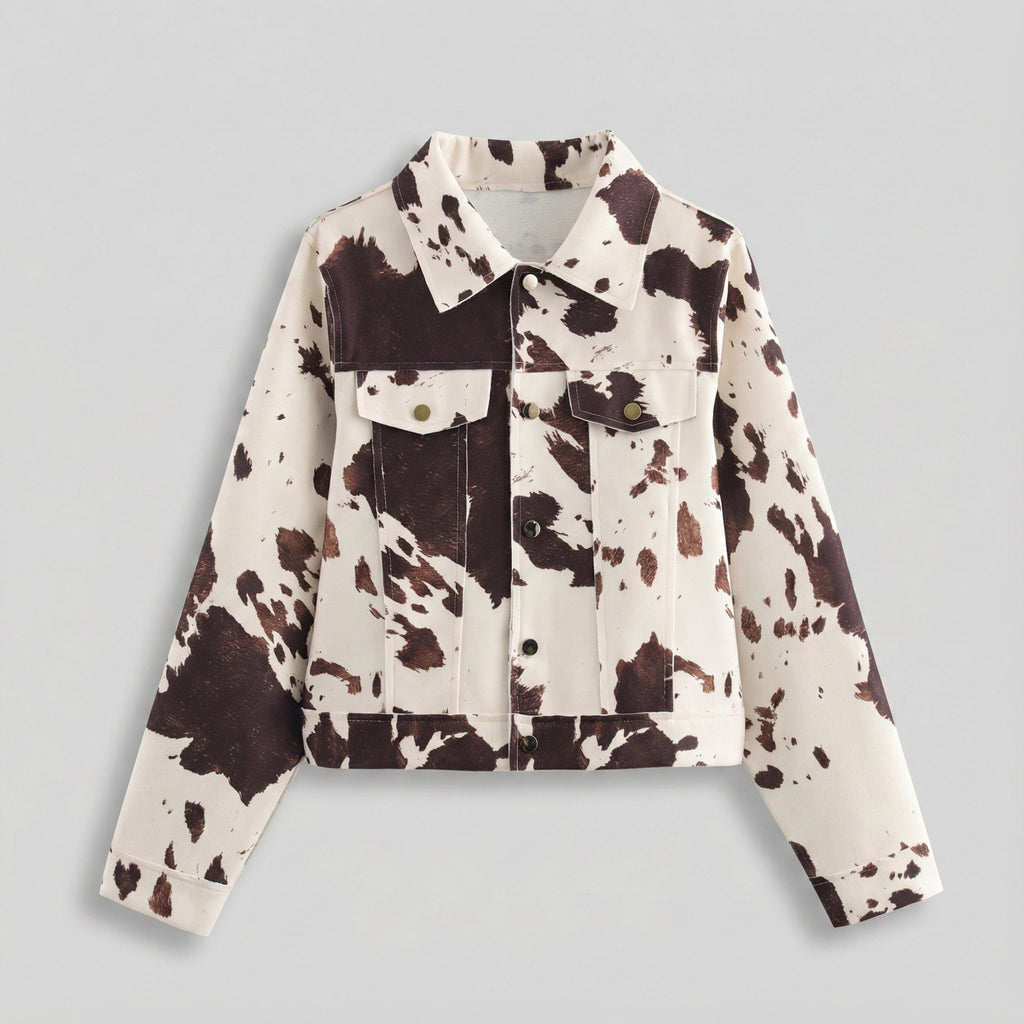 Cow print jacket on a light gray background