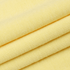 Close-up of yellow fabric with visible texture