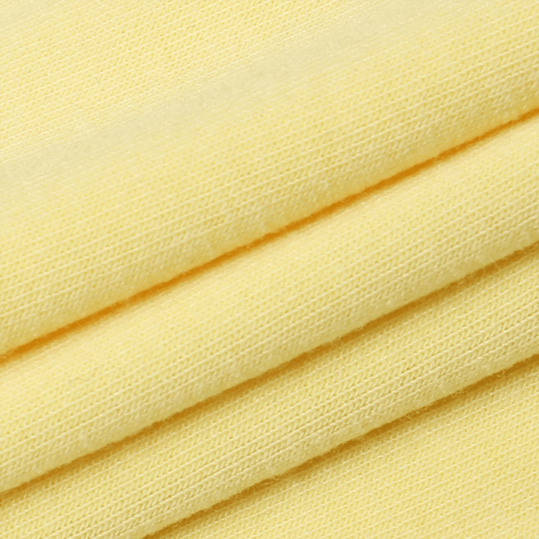 Close-up of yellow fabric with visible texture