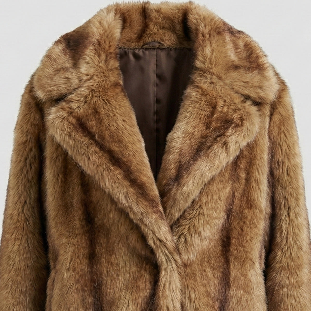 Brown fur coat on a light gray background