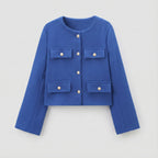 Blue jacket with button details on a light gray background
