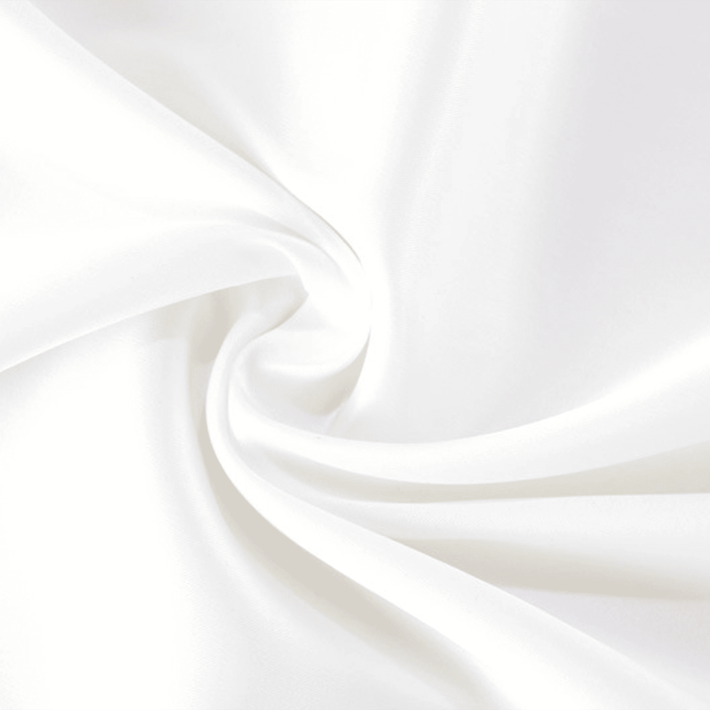 White fabric with folds on a white background
