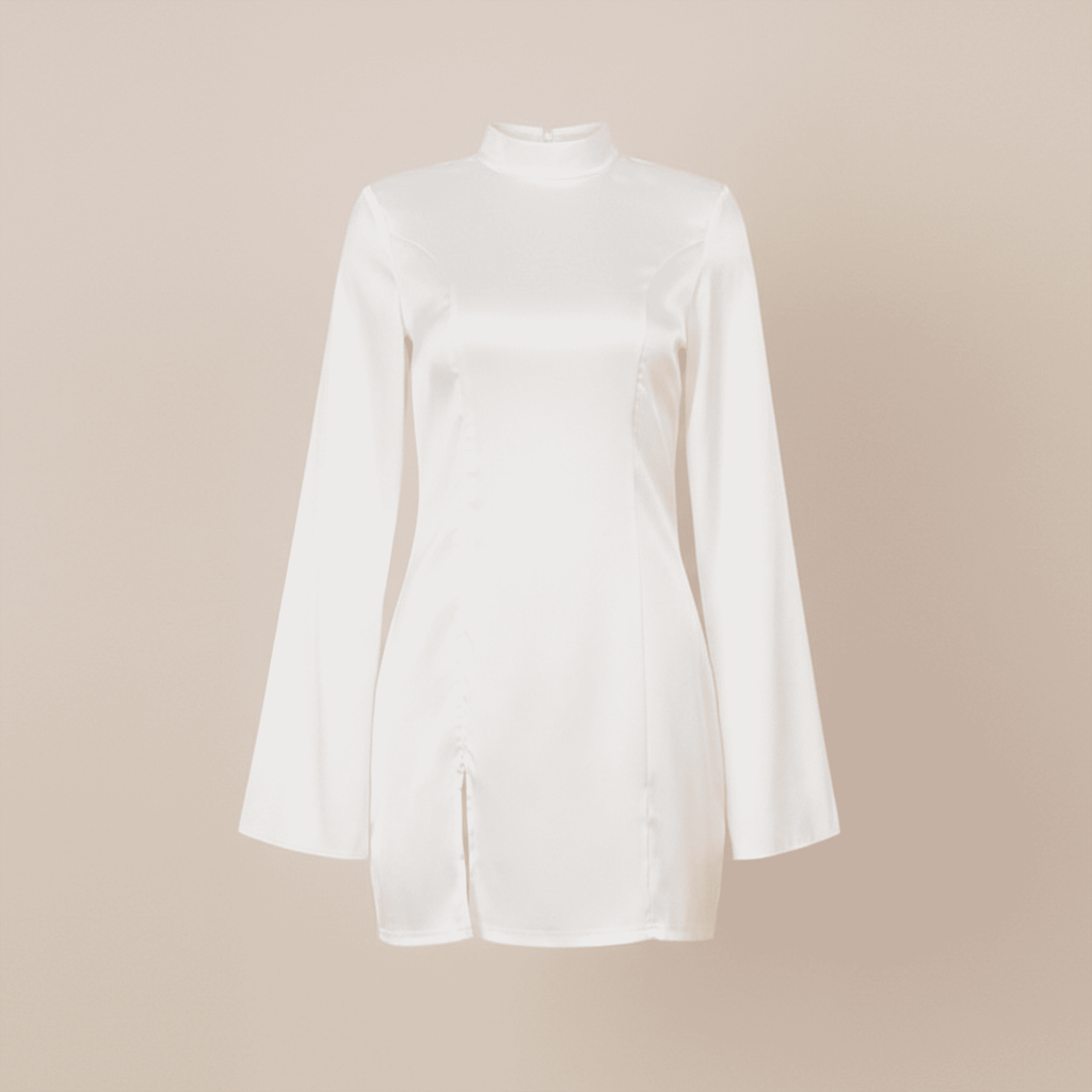 White long-sleeve shirt on a beige background