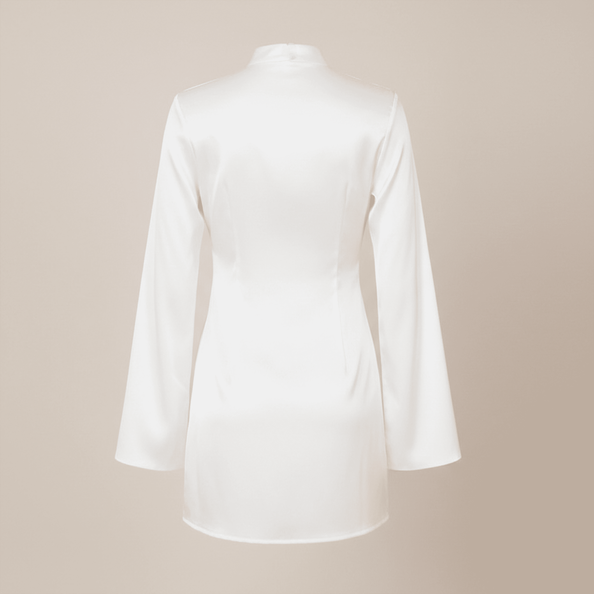 White blouse with long sleeves on a beige background