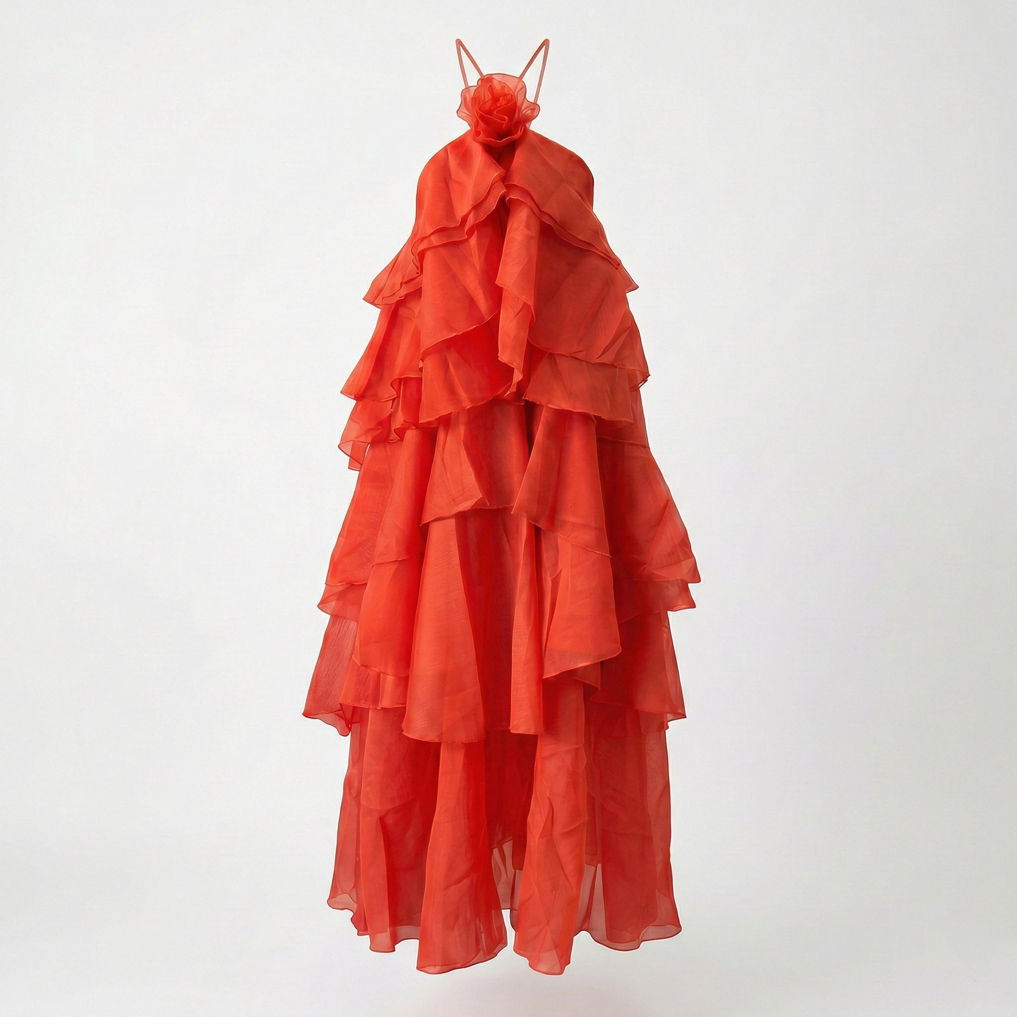 Orange tiered dress on a white background