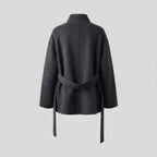 Dark gray coat with a belt on a light gray background