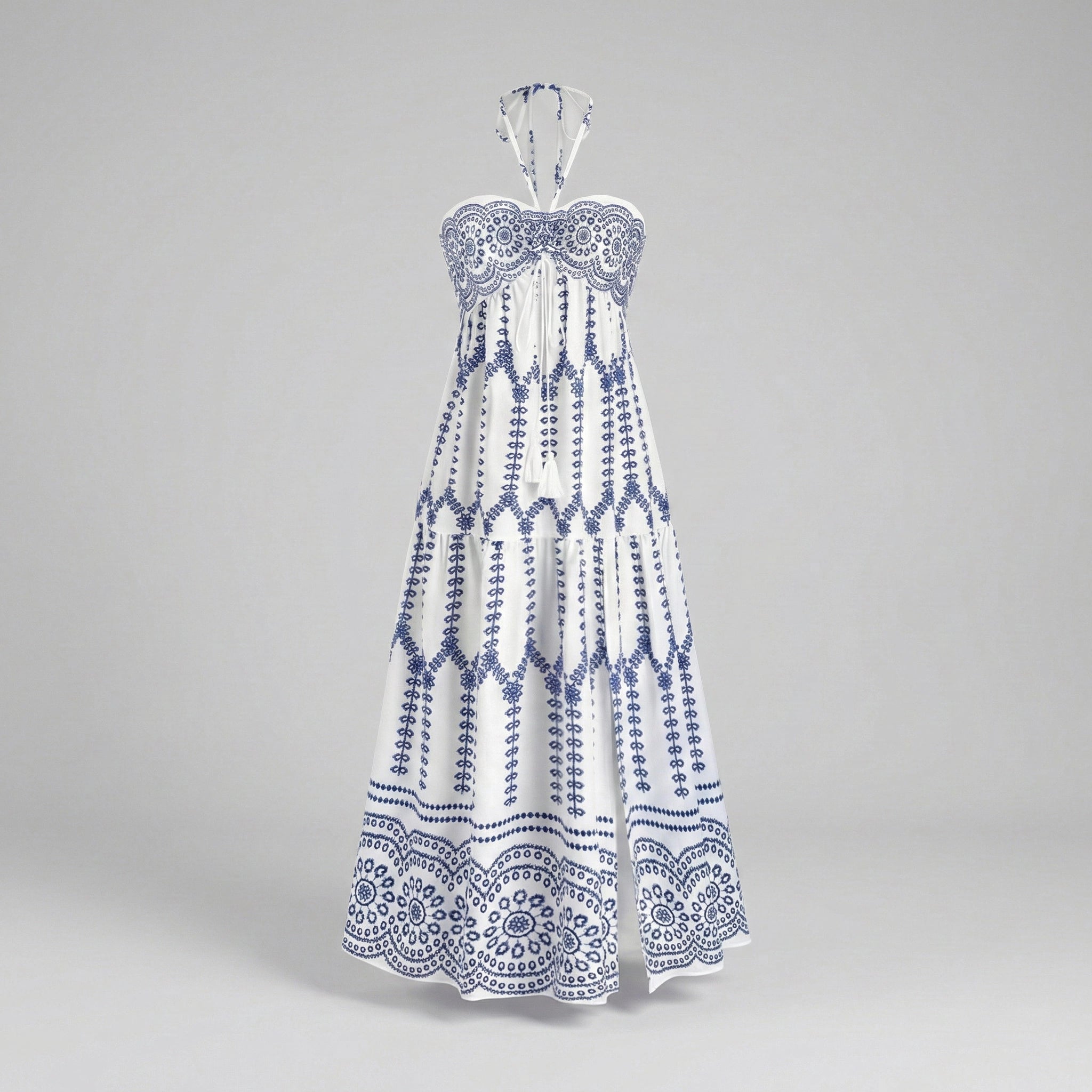 White dress with blue patterns on a gray background