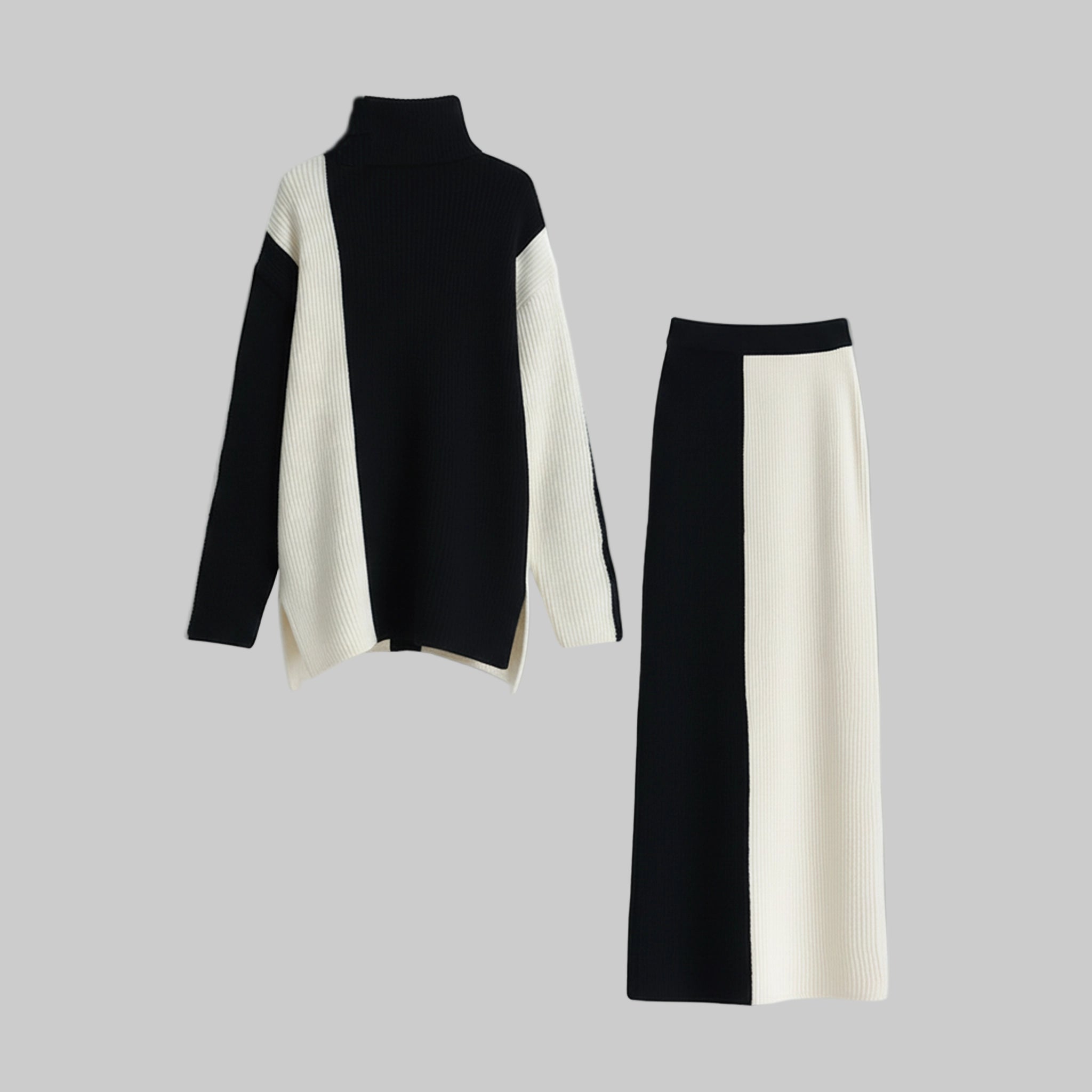 Black and white turtleneck sweater and skirt set on a light gray background