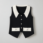 Black vest with white collar and buttons on a gray background
