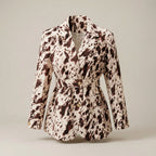 Patterned blazer on a neutral background