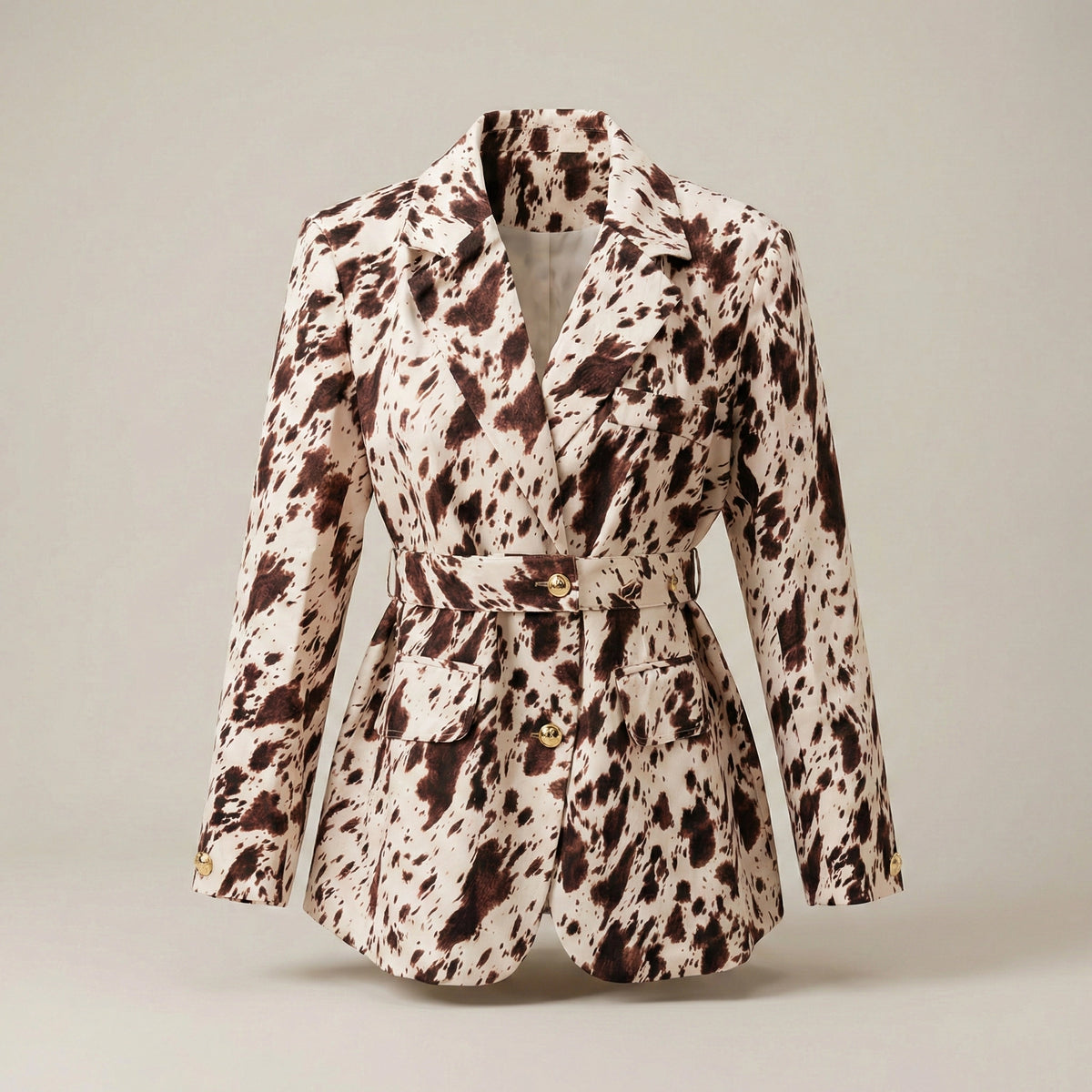 Patterned blazer on a neutral background