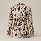Patterned blazer on a plain background