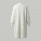 White textured cardigan on a gray background