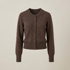 Brown cardigan on a beige background