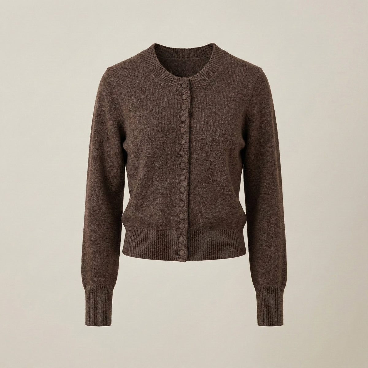 Brown cardigan on a beige background