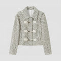 Textured jacket with button details on a light gray background