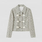 Textured jacket with button details on a light gray background