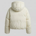White puffer jacket with a hood on a light gray background