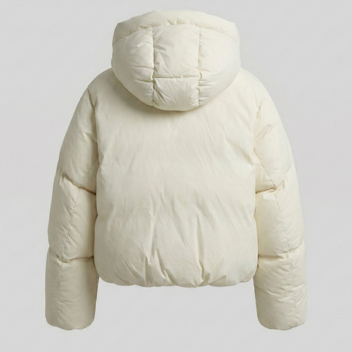 White puffer jacket with a hood on a light gray background