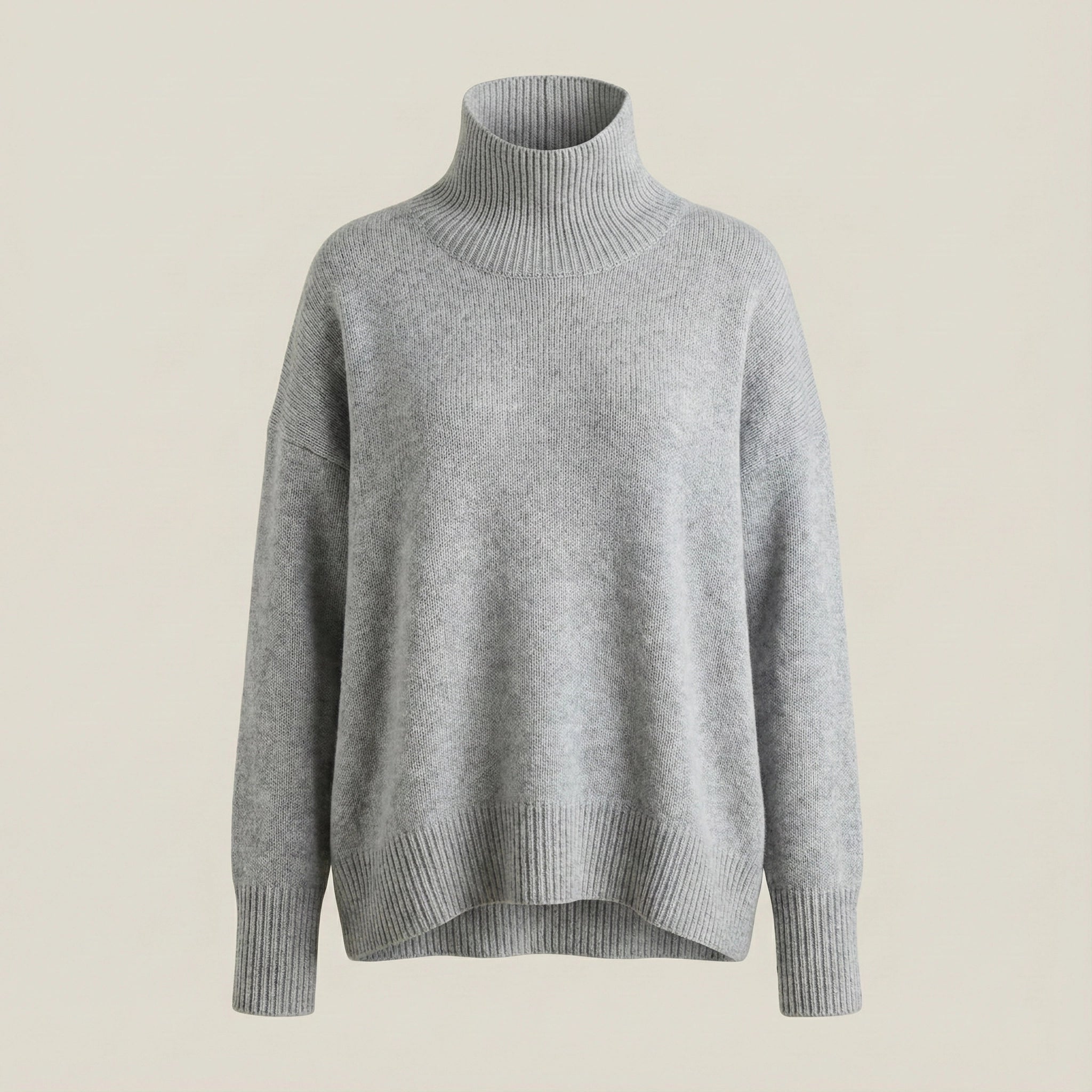 Gray turtleneck sweater on a beige background