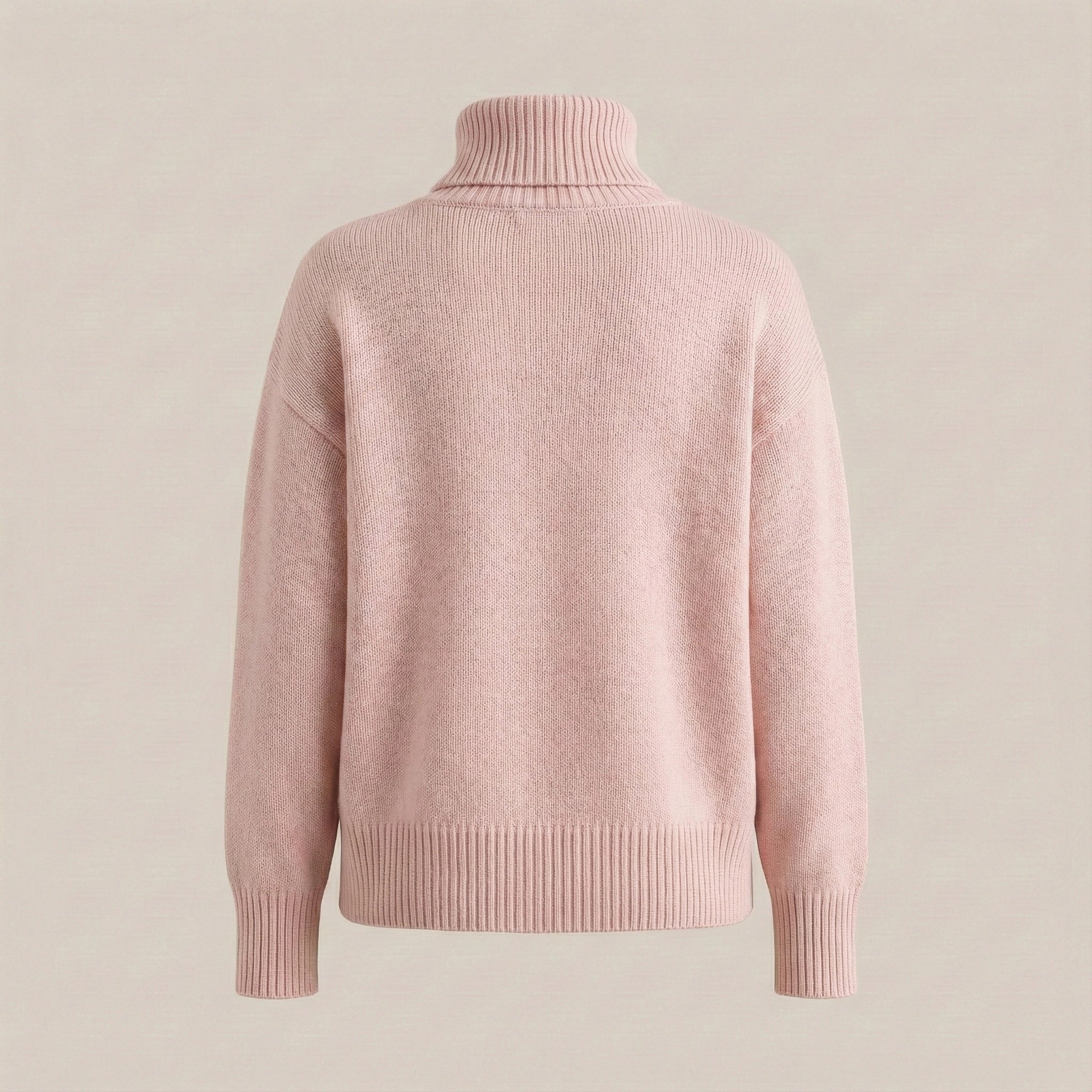 Pink turtleneck sweater on a beige background