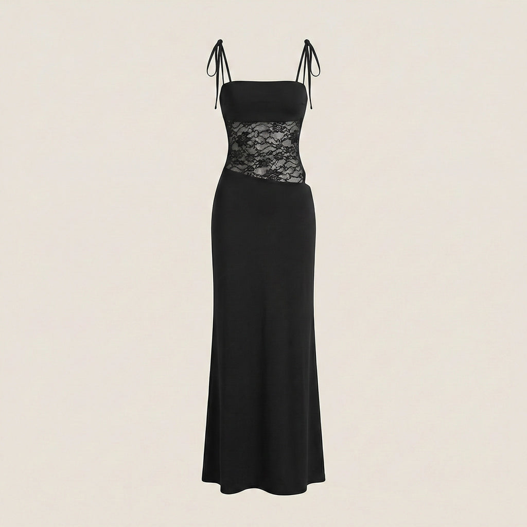 Black evening gown with lace detailing on a beige background