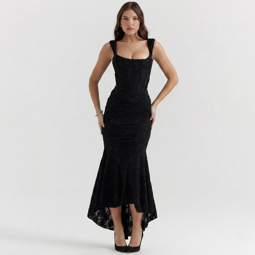 Woman wearing a black dress on a white background