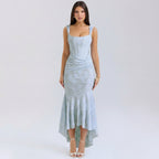 Woman wearing a light blue dress on a white background