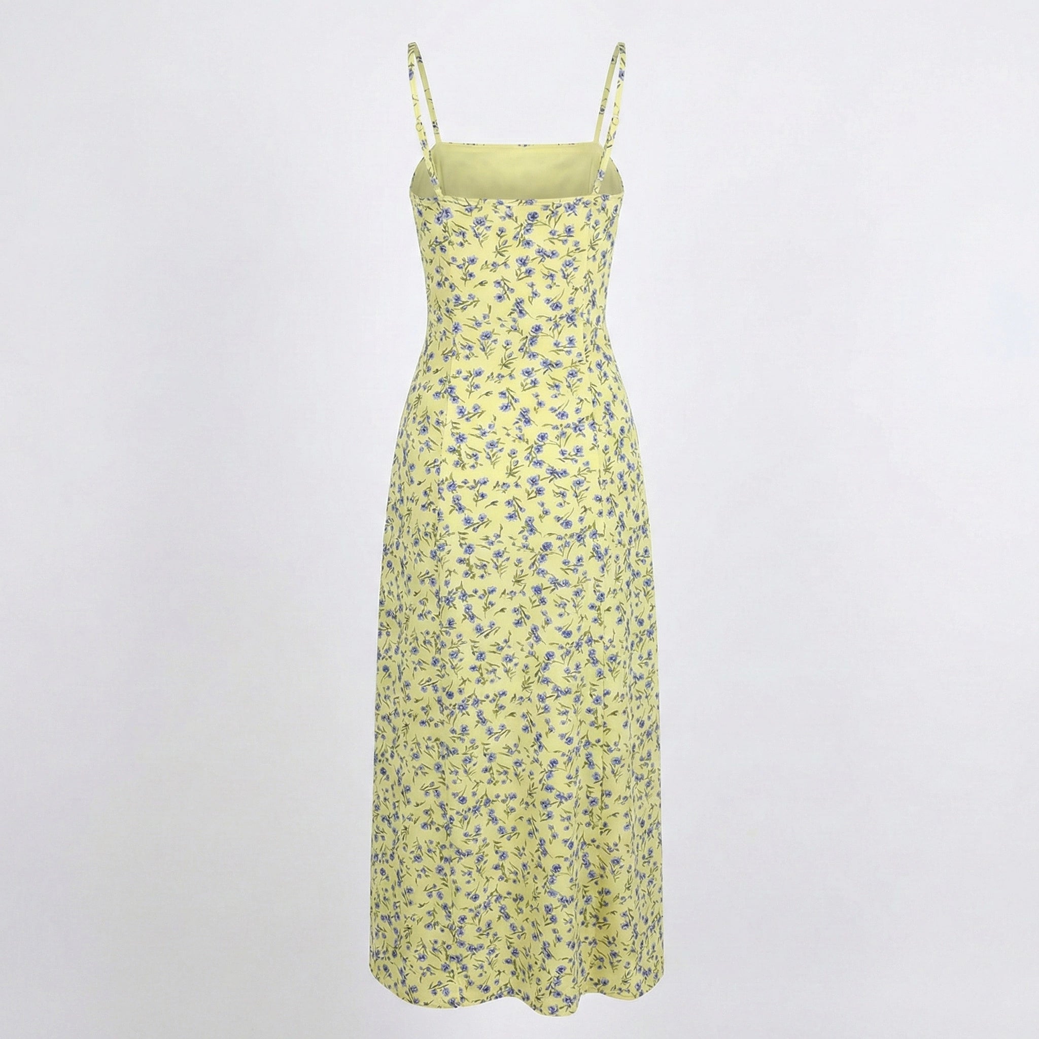 Yellow floral dress on a light gray background