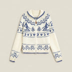 White zip-up sweater with blue pattern on a light gray background