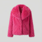 Pink fluffy jacket on a light gray background