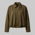 Brown leather jacket on a gray background