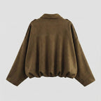 Brown cape on a light gray background
