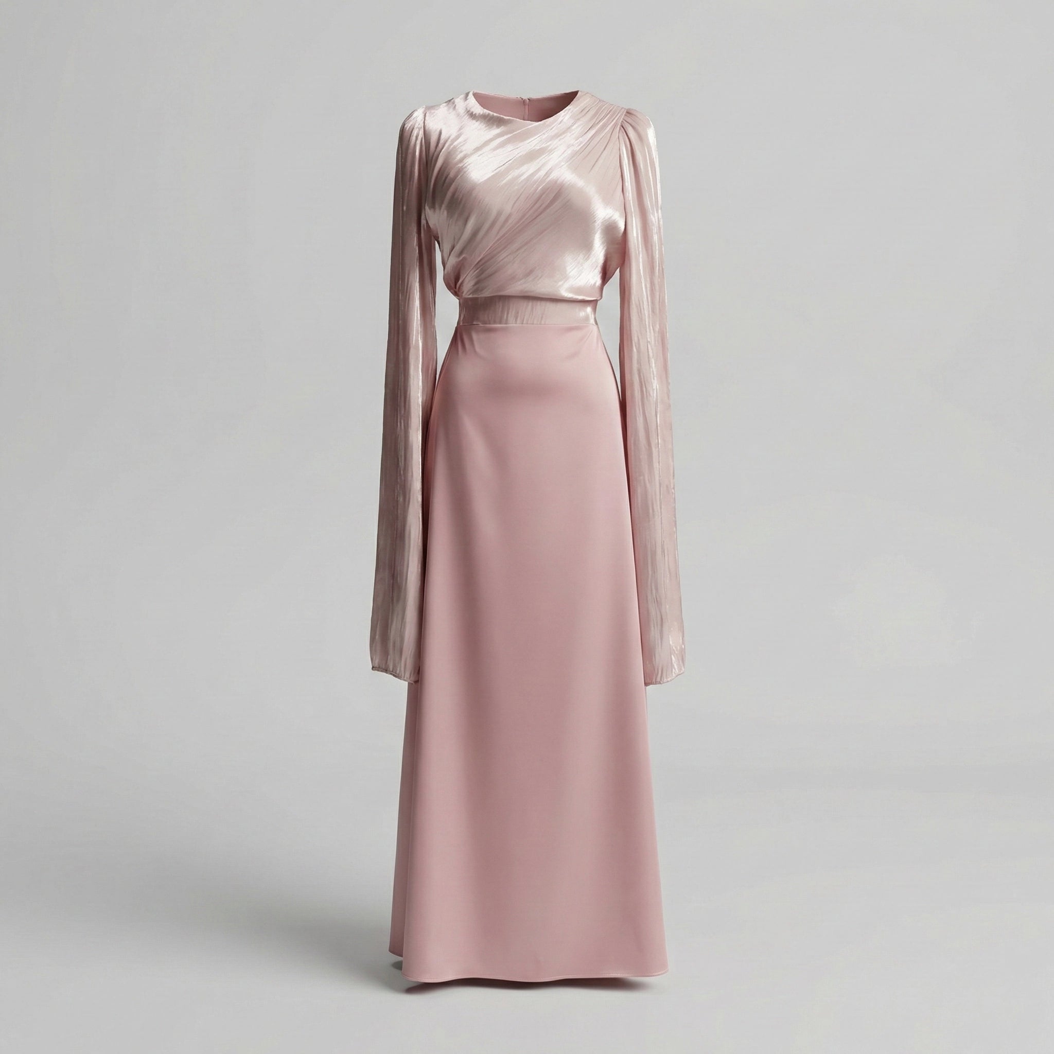 Pink dress with long sleeves on a light gray background