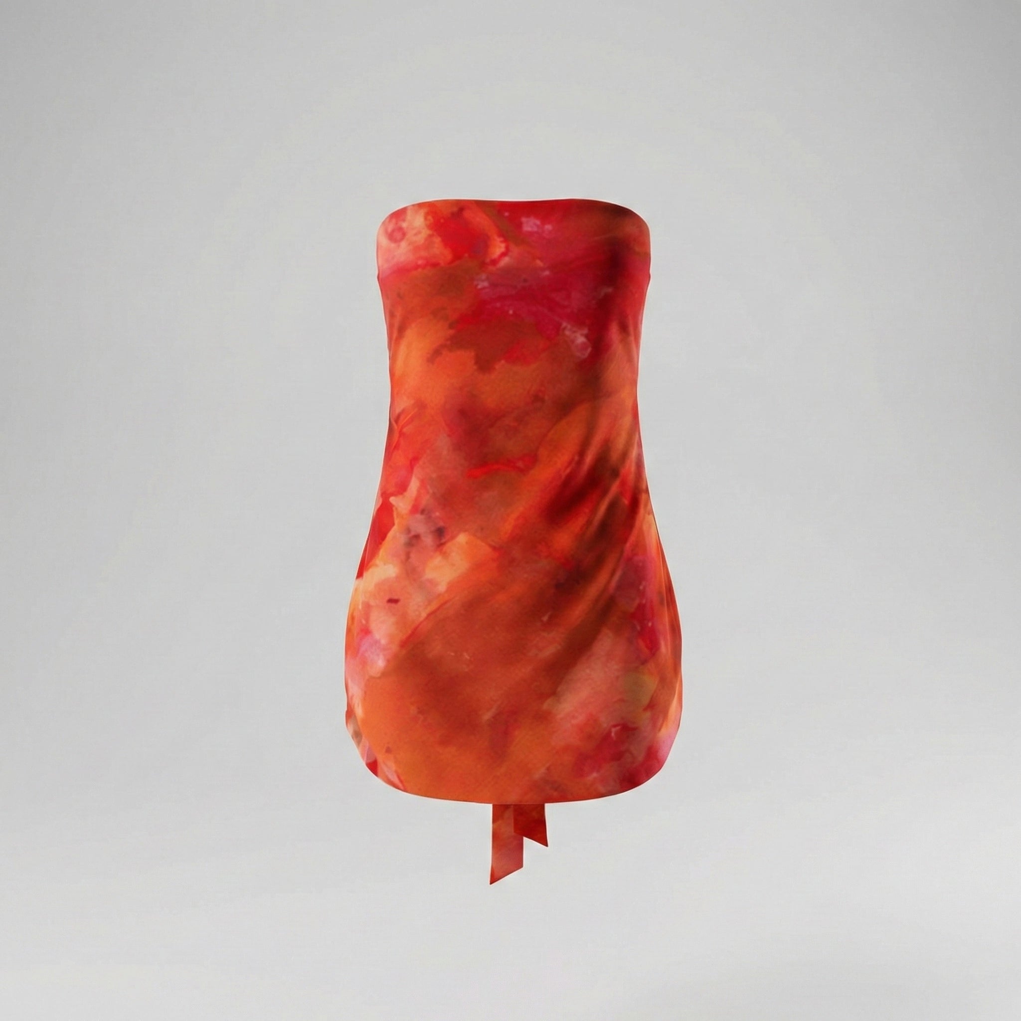Red and orange strapless top on a gray background
