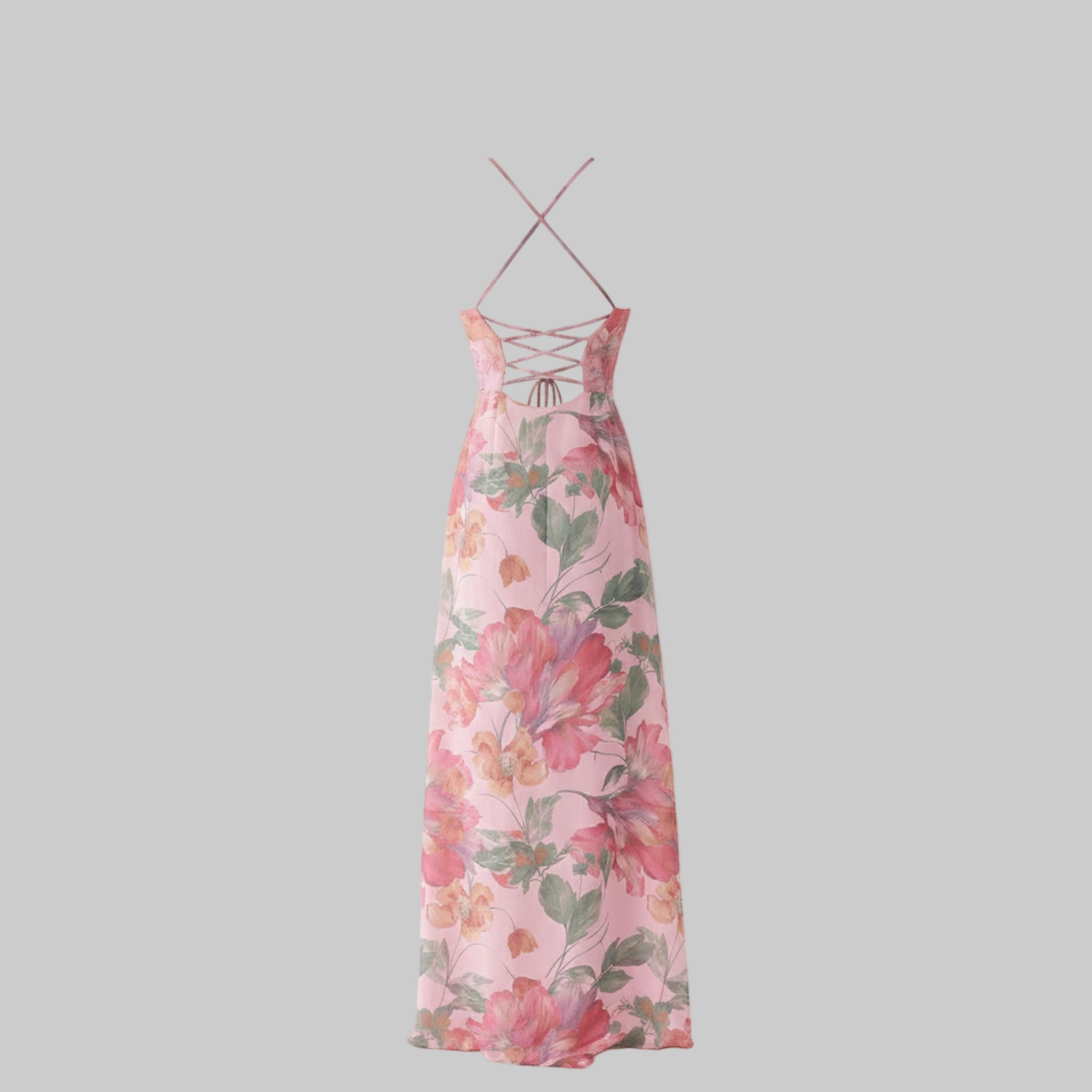 Floral dress with criss-cross straps on a gray background