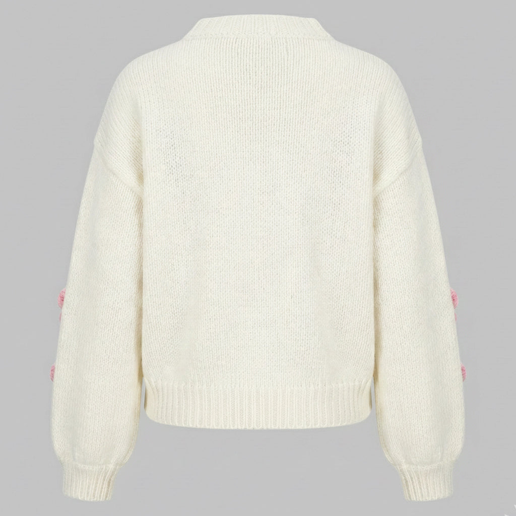 White sweater on a gray background